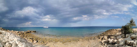 Protaras. Famagusta area. Cyprus. panorama. The stone coast of the Mediterranean Sea, a white...