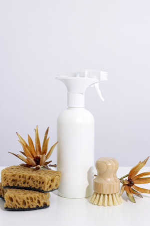 Zero waste cleaning product and dish washing brush, sponge on white background. Concept Eco-friendly, natural laundry, verticalの写真素材