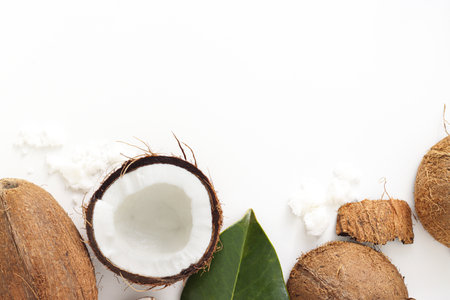 Coconut on white background. Home spa treatment concept, organic cosmetic. Copyspaceの写真素材