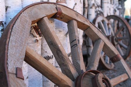 old wooden cart wheelの写真素材