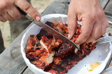 delicious pork ribs on the table during a picnicの写真素材