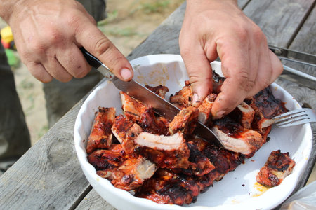 delicious pork ribs on the table during a picnicの写真素材