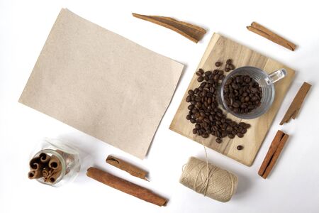 Scattered coffee beans, cinnamon. Craft background. Copy space. Place for text and design. Top view. Flat lay.の写真素材
