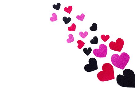 White background. Black, red, pink felt hearts. Copy space. Place for text and design. Valentine's card. Hand made decor for holidays. の写真素材