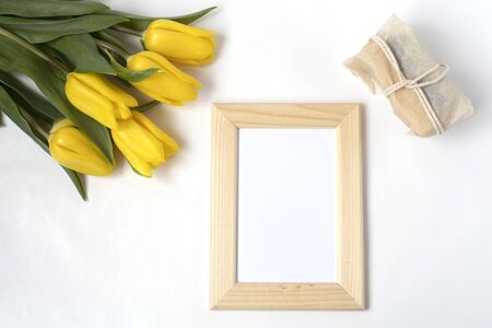 Present for international ladies day. Hand made soap, lip balm, beautiful tulips. White background....