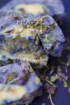 Lavender soaps on the blue background. Natural cosmetic
