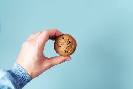 Cupcakes with raisins and lemon. Blue background. Copy space. Place for text and design. Quarantine...