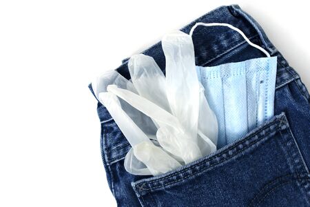 White background with blue jeans. Coronavirus concept.の写真素材