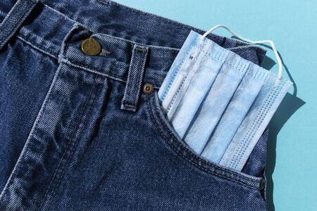 Blue jeans with medical maskの写真素材