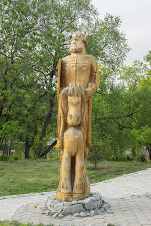 KHABAROVSK, RUSSIA - MAY 18, 2014: Wooden figures depicting one of the Three Heroes (Tri Bogatyrya) in Severniy Parkのeditorial素材