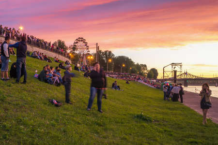 TVER, RUSSIA - JUNE 28, 2015: People in the City Day walk on the waterfront Stepan Razin at sunset. In 2015 city Tver celebrates 880 yearsのeditorial素材