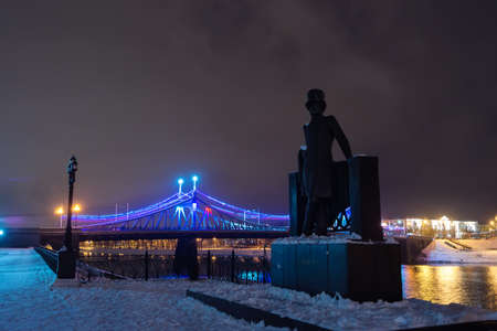 TVER, RUSSIA - DECEMBER 15, 2015: The monument to Alexander Pushkin and Starovolzhsky bridge at nightのeditorial素材