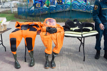 TVER, RUSSIA - APRILL, 30, 2016: Showing protective clothing at the bottom of a firefighter in the city parkのeditorial素材
