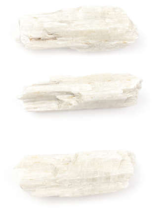 Wollastonite raw white, on a white background.の写真素材