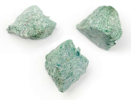 Green Fuchsite on a white background.の写真素材
