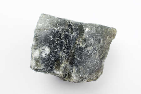 Raw black Labradorite on a white background.の写真素材