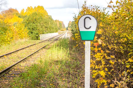 Railway sign C on the obligation to feed the whistle in order to safely travel through artificial structuresの写真素材