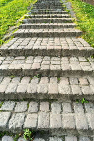 Brick steps in autumn city Park.の写真素材