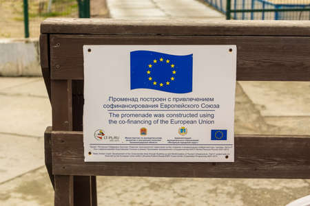 YANTARNYY, KALININGRAD OBLAST, RUSSIA - OCTOBER, 13, 2017: A sign on the Baltic sea promenade, the inscription promenade built with co-financing of the European Union.のeditorial素材