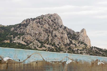 Mountain Cat and breakwater on a cloudy summer dayの写真素材