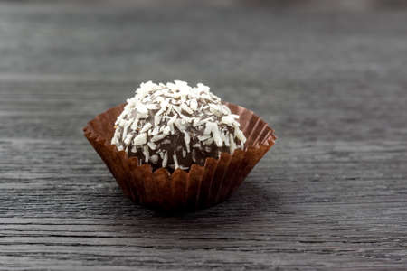 Small chocolate cake with coconut dressingの写真素材