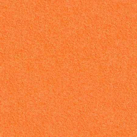 The texture of orange velvet paper. Bright seamless backgroundの写真素材