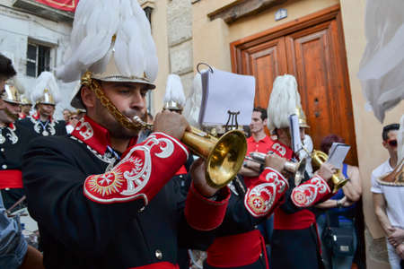 Granada, Spain, April 17, 2014: people who play the golden cornet of the band of the procession of...