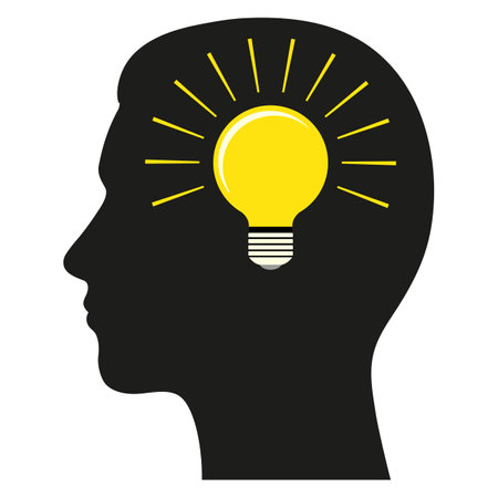 Creative thinking logo illustration.Human head with a light bulb on a white backgroundのイラスト素材