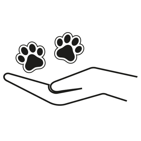 Illustration of caring for animals.Human hand with dog paws on a white background.のイラスト素材
