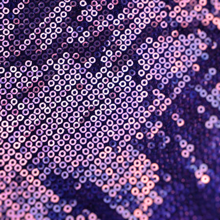 Metallic sequin fabric texture background.