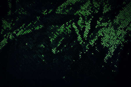Green metallic sequin fabric texture bckground.の写真素材