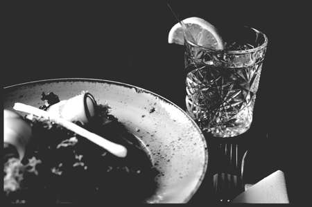 table setting with a glass of clear waterの写真素材