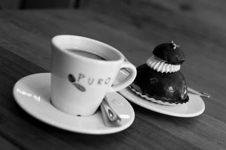 Coffee and tea with sweets on a table