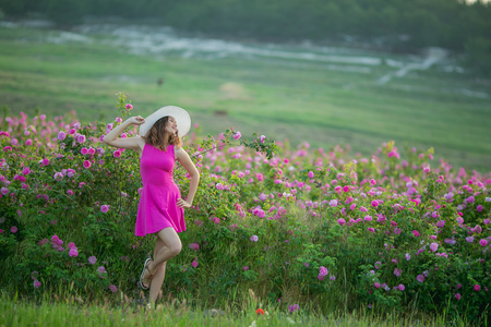 Girl in pink dress and vintage Cap.の写真素材