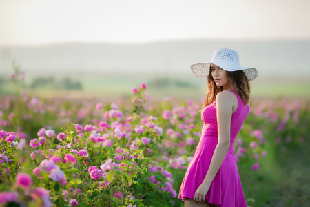Girl in pink dress and vintage Cap.の写真素材