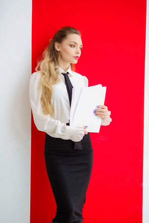 Business Lady with documents in hands preparing for presentationの写真素材