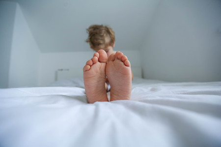 Five years old child sleeping with hat comfortably.の写真素材