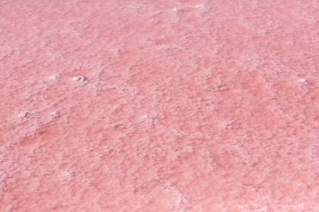 Water of natural red color. Salt industry a place for the extraction of sea salt.の写真素材