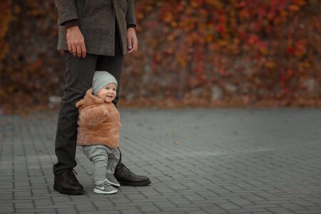 Baby Takes First Steps With Fathers Help.の写真素材