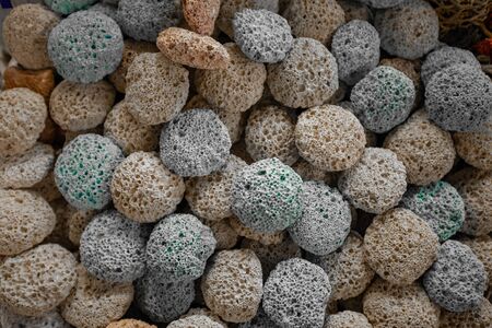 Pumice stone foot shaped scrub tool close upの写真素材