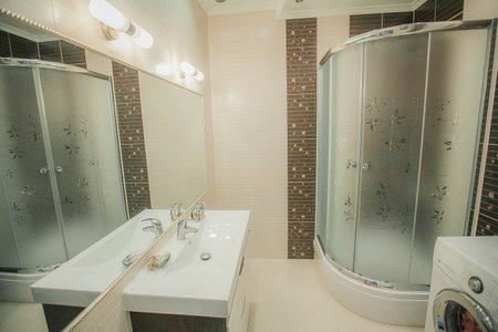 The interior of a modern apartment after renovation. Presentation of the apartment in light warm tonesの写真素材