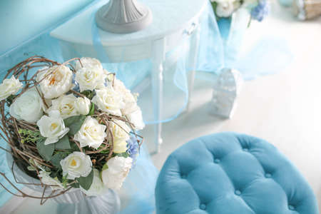Decorations in the room in a soft blue shade gifts and flowersの写真素材