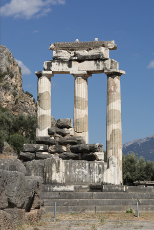 the ruins of the ancient temple of Athena in Delphi, located in the mountains, Sunny day, summer,...