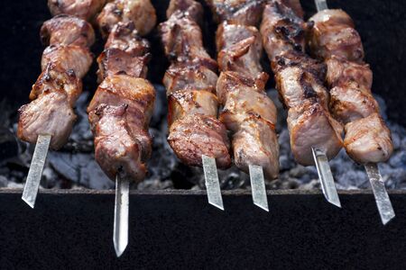 kebab, meat on skewers, fried on coalsの写真素材