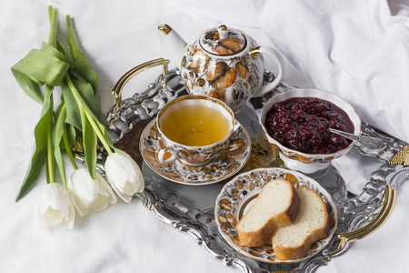 tea, mug, tulips, kettle, bread, jam, 3, white tulips, tea set, metal tray, white  sheetの写真素材