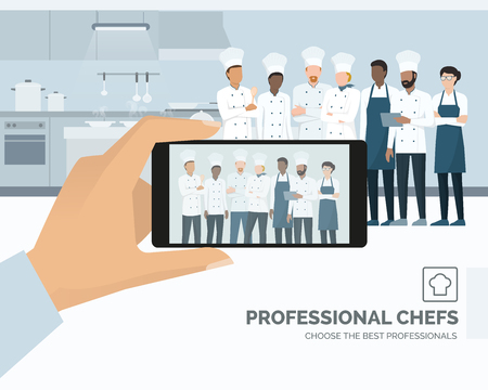 Professional chefs posing in the restaurant kitchen, a man is taking a picture using a smartphone, subjective point of viewのイラスト素材
