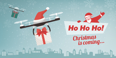 Drones with Santa's hat delivering Christmas gifts in the city, snow falling and textのイラスト素材