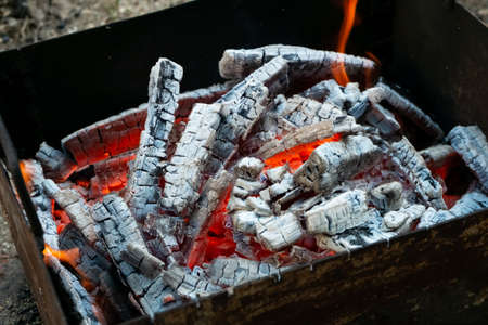 Hot burning coals in the grill. BBQ cooking picnicの写真素材