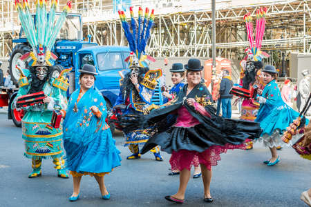 London, United Kingdom - March 13, 2016: St Patrick's Day Parade and Festival at Trafalgar Square. Bolivian traditional dancers.のeditorial素材