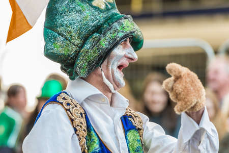 London, United Kingdom - March 13, 2016: St Patrick's Day Parade and Festival  at Trafalgar Square. Cheerful Irish leprechaun.のeditorial素材